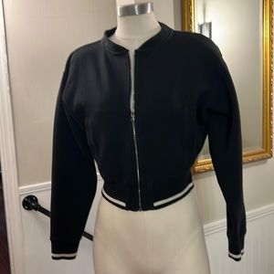 Varley zip up jacket and black with white stripes extra small